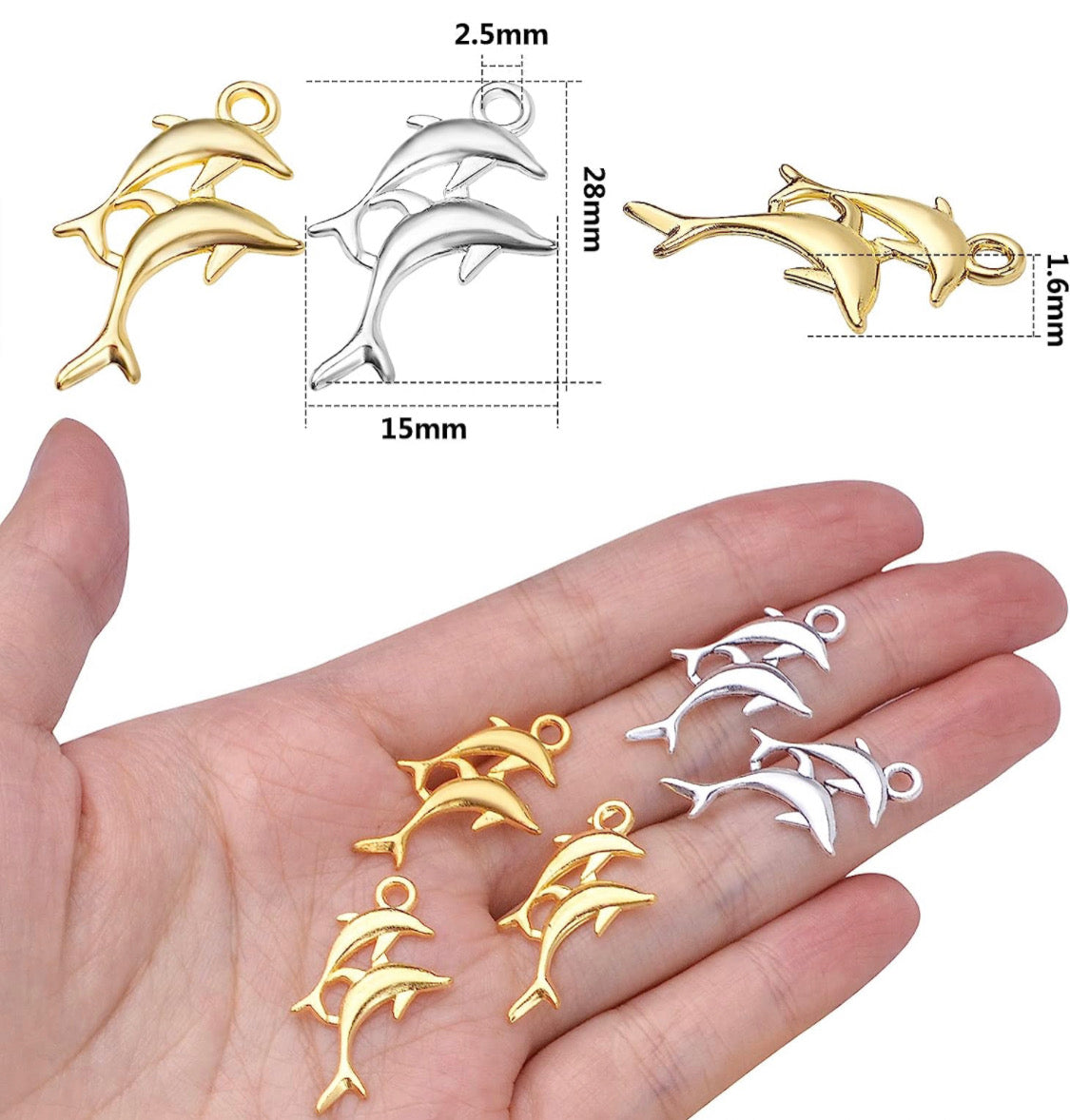 Silver and gold dolphin charms